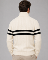 Close-up of the half-zip fastening and high ribbed collar on a cable-knit jumper