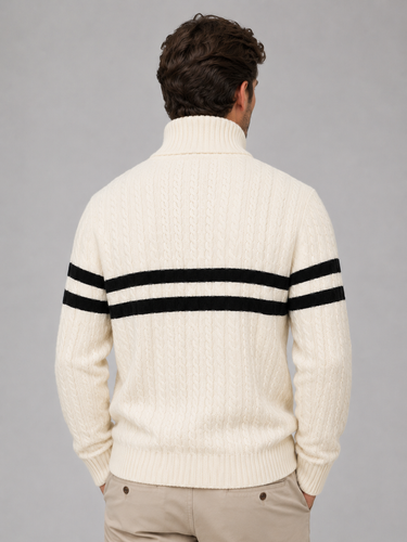 Close-up of the half-zip fastening and high ribbed collar on a cable-knit jumper