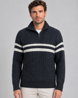 Side view of the straight-silhouette cable-knit jumper showing long sleeves and ribbed cuffs
