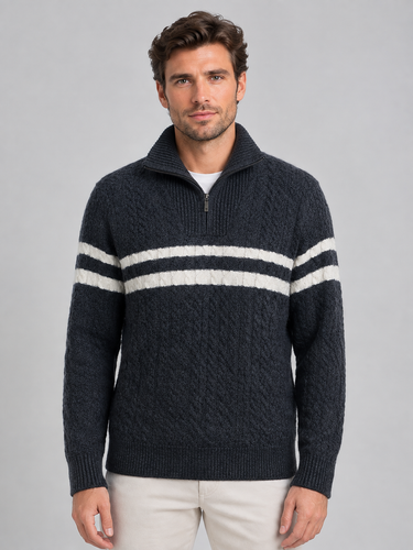 Side view of the straight-silhouette cable-knit jumper showing long sleeves and ribbed cuffs