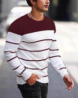 Side view of men's fine knit striped jumper showing silhouette and fit