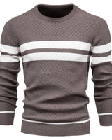 Detail shot of ribbed cuffs on a men's striped jumper