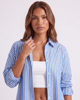 Back view of striped two-piece shirt and shorts set