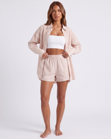 Flat lay of striped shirt and shorts two-piece set