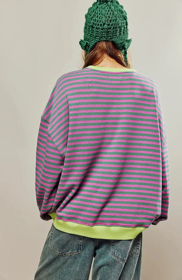 Close-up of the stripe pattern and round neckline detail