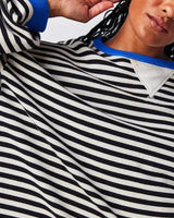 Front view of the jumper in black and red colourway