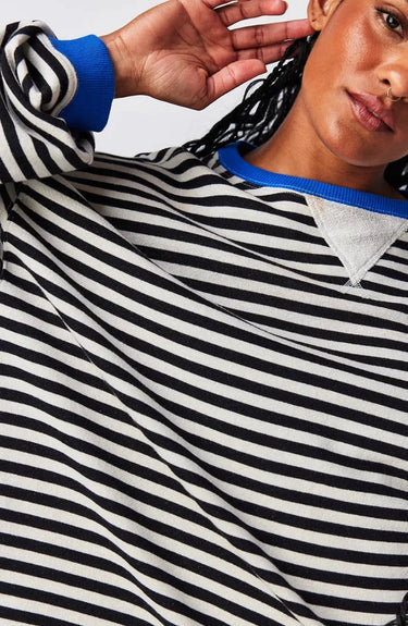 Front view of the jumper in black and red colourway