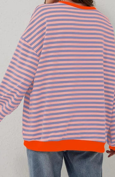 Detail shot of the hem and body width of the loose-fit jumper
