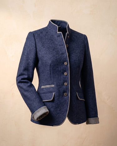 Side view showing the tailored silhouette and pocket trim detail