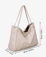 Tote bag carried on the shoulder of a model