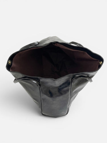 Flat lay of the tote bag showing front and back panels