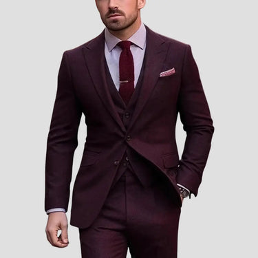 Close-up of the blazer's notch lapels and buttoned front on the three-piece suit