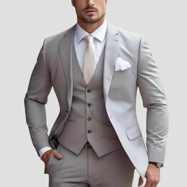 Rear view of the three-piece suit displaying the structured back and tailored trouser cut