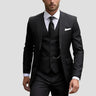 Side view of the tailored three-piece suit showing the fitted silhouette and trouser line