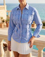 Detail of the shirt hem and lower woven panel