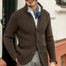 Men's waffle-knit cardigan worn over a collared shirt, three-quarter view