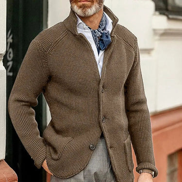 Close-up of the four-button front fastening and stand collar detail