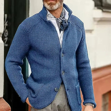 Men's cardigan styled with tailored trousers, full-length view