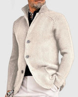 Men's waffle-knit cardigan worn open over a plain crew-neck top