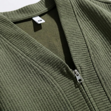 Rear view of men's textured zip-up cardigan