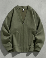 Side view of men's zip-up cardigan showing silhouette and sleeve length