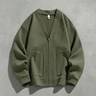 Side view of men's zip-up cardigan showing silhouette and sleeve length