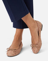 Three-quarter angle of the tweed ballet flat on a plain background