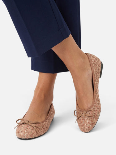 Three-quarter angle of the tweed ballet flat on a plain background