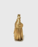 Rear view of the structured hoop bag showing the wraparound twisted design