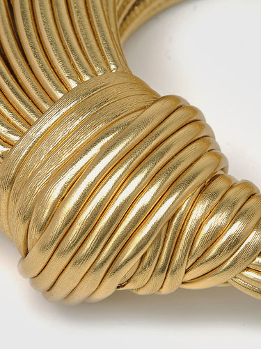 Close-up of the multi-layered twisted panel on the front of the hoop bag