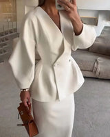 Two-Piece Skirt Suit with Puff Sleeve Blazer and V-Neck Detail