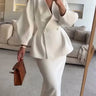 Two-Piece Skirt Suit with Puff Sleeve Blazer and V-Neck Detail
