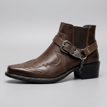 Close-up of the buckle strap and pointed toe on a men's vintage western boot