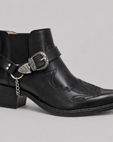 Men's high-top western cowboy boot with pointed toe and buckle strap detailing