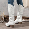 Knee-high western cowboy boots with embroidered shaft and block heel, pointed toe, front view