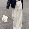 Wide-Leg Jeans with High Waist and Contemporary Look