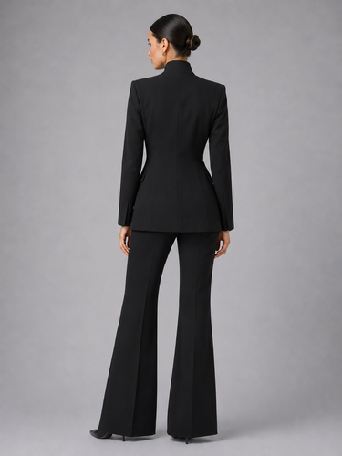 Side profile showing the wide-leg silhouette and full-length trouser hem