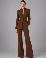 Detail shot of the high waist and wide-leg cut of the trousers