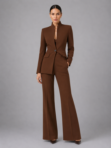 Detail shot of the high waist and wide-leg cut of the trousers