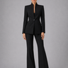 Front view of the collarless blazer and wide-leg trousers co-ord set worn together
