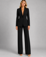 Detail shot of the wide-leg trouser waistband and drape