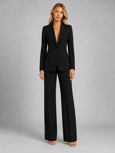 Detail shot of the wide-leg trouser waistband and drape