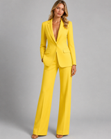 Three-quarter view showing the full-length trouser cut and jacket fit