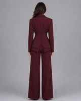 Close-up of the blazer's peaked lapel and button-front closure