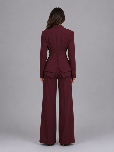 Close-up of the blazer's peaked lapel and button-front closure
