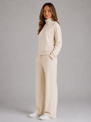 Side view of the wide leg trousers showing the relaxed fit and drape