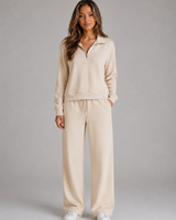 Front view of the two-piece co-ord set showing the half-zip sweatshirt and wide leg trousers