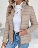 Close-up of stand collar and full-length zip fastening