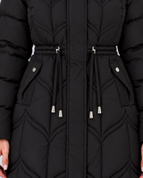 Detail shot of the front pockets on the quilted puffer coat
