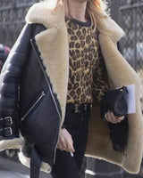 Back view of oversized faux leather jacket with faux fur lining visible at collar